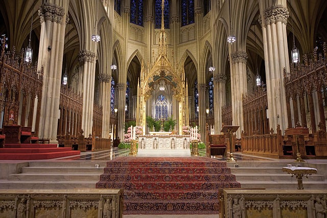 St. Patricks Cathedral altar can be a beautiful setting for funeral flowers.  Its gothic architecture and gold accents bring peace and tranquility to every service.