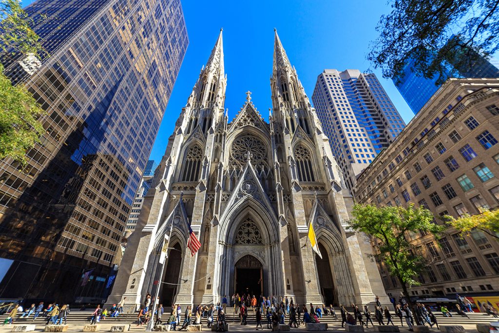 The monumental architecture of St. Patricks Cathedral in NYC offers so many compliments to a variety of funeral flower choices.